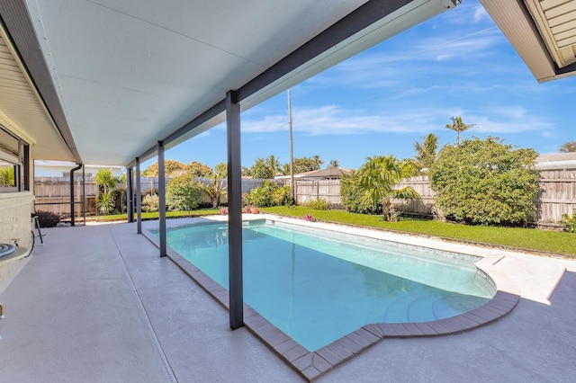 view of swimming pool with a patio area