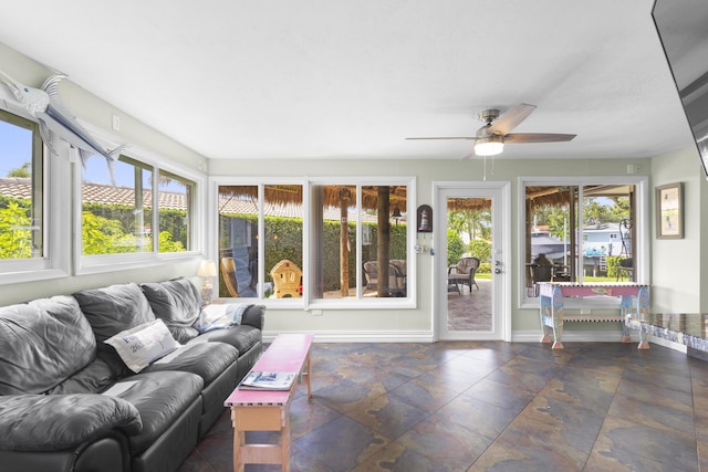 sunroom with ceiling fan