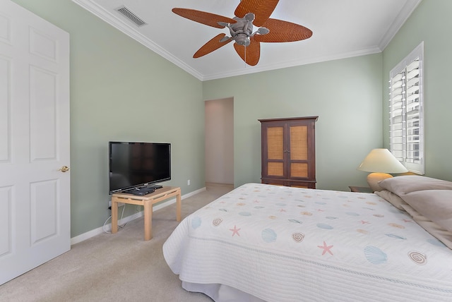 bedroom with ceiling fan, crown molding, and light carpet