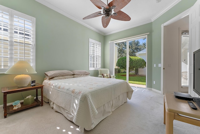 carpeted bedroom with multiple windows, access to outside, ceiling fan, and crown molding