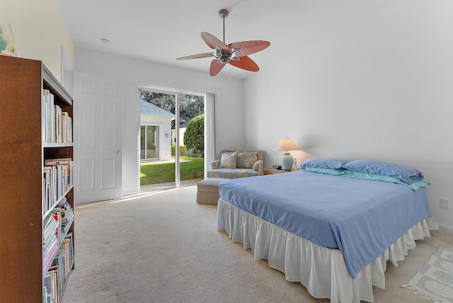 bedroom featuring access to outside, ceiling fan, and light colored carpet