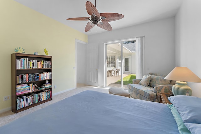 carpeted bedroom featuring ceiling fan and access to exterior