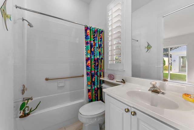 full bathroom featuring tile patterned flooring, shower / bath combo, vanity, and toilet