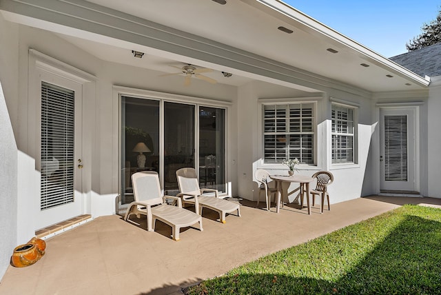 view of patio with ceiling fan