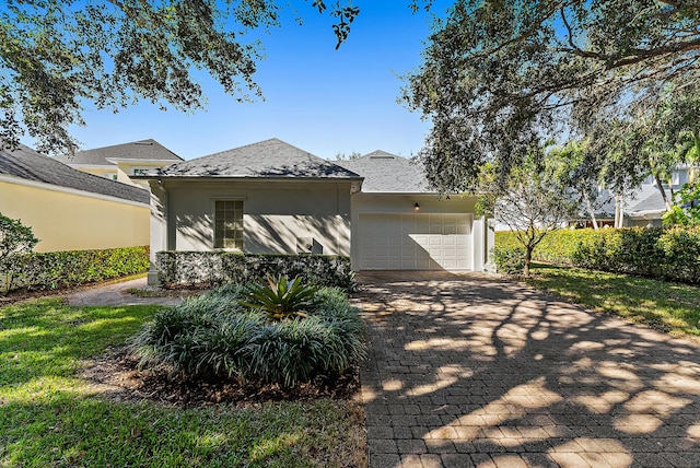 view of front of property with a garage