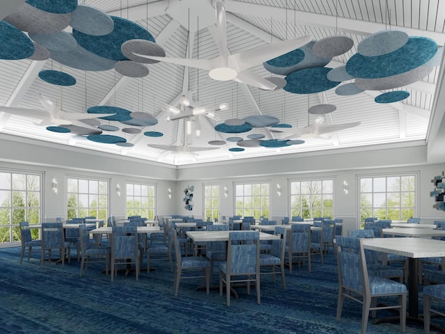 dining space with beamed ceiling, high vaulted ceiling, and a wealth of natural light