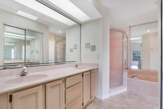 bathroom featuring tile patterned floors, vanity, and independent shower and bath