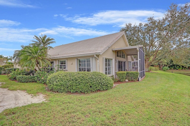 exterior space with a lawn