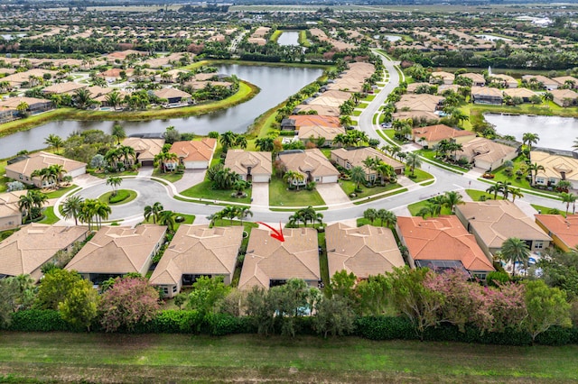 drone / aerial view featuring a water view