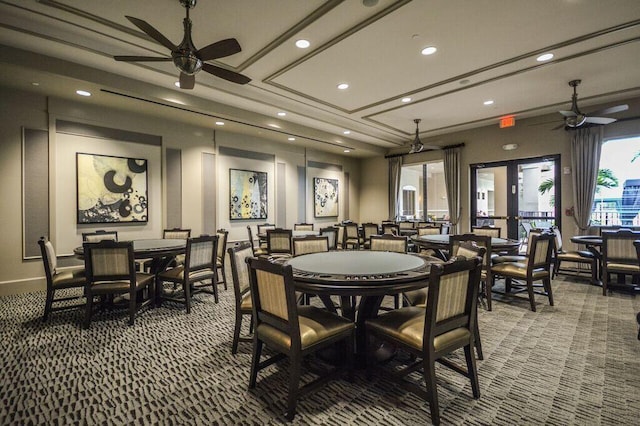 dining room featuring carpet floors and ceiling fan