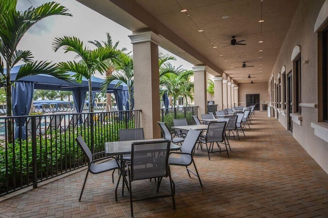 view of patio with ceiling fan