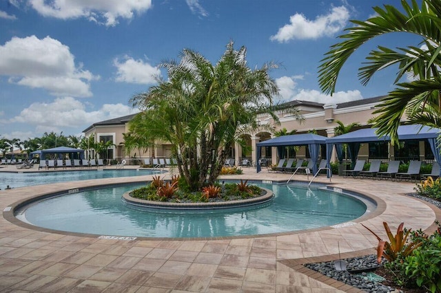 view of swimming pool with a gazebo