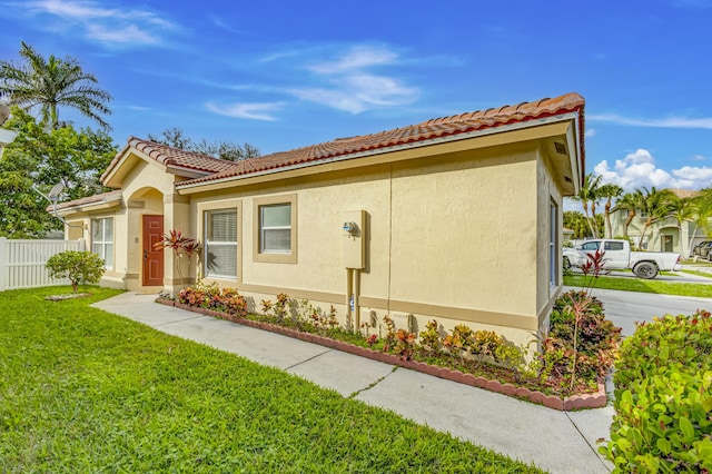 exterior space with a yard