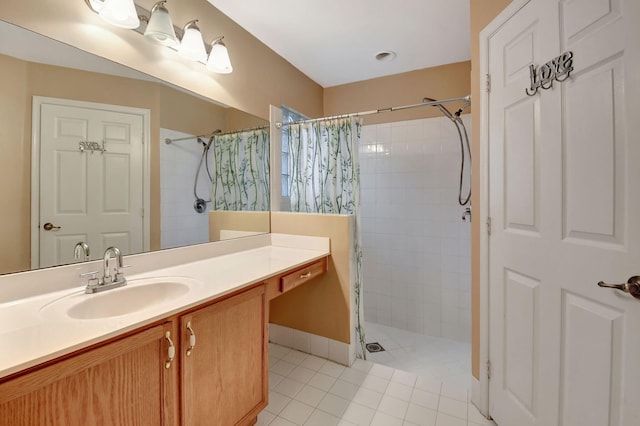 bathroom featuring tile patterned floors, vanity, and a shower with shower curtain