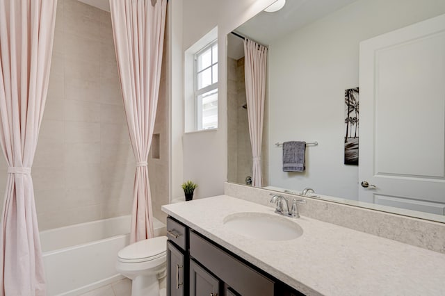 full bathroom with tile patterned flooring, vanity, shower / tub combo, and toilet