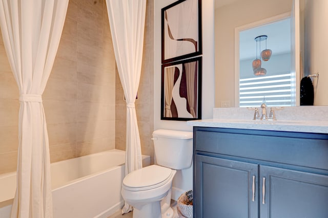 full bathroom with shower / bath combo, vanity, and toilet