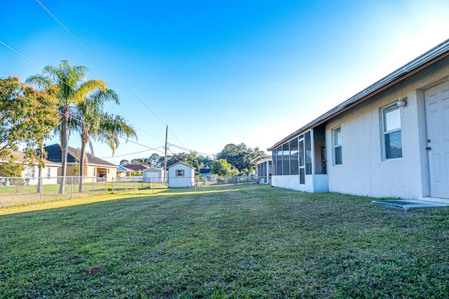 view of yard with a sunroom