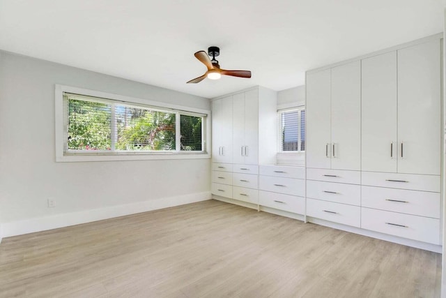 unfurnished bedroom featuring ceiling fan and light hardwood / wood-style flooring