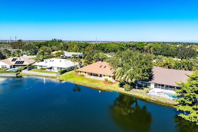 drone / aerial view with a water view