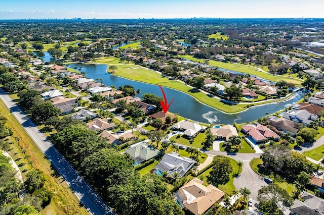 birds eye view of property featuring a water view