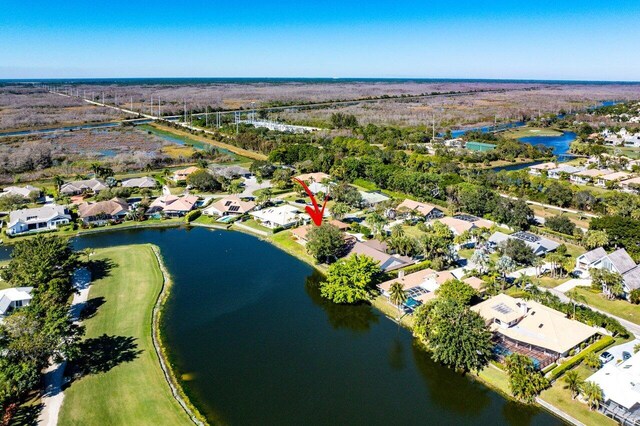 drone / aerial view with a water view