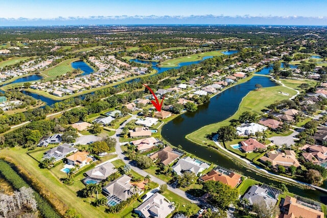 bird's eye view with a water view