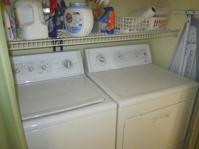 laundry area with separate washer and dryer