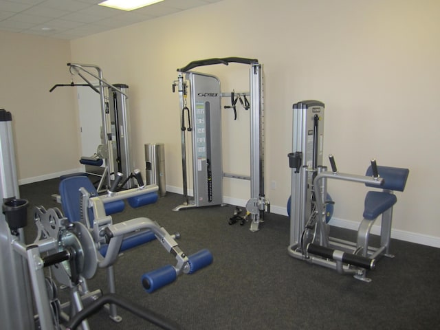 workout area with a drop ceiling