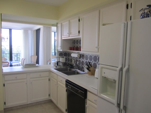 kitchen featuring sink, white fridge with ice dispenser, white cabinets, and black dishwasher