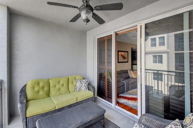 balcony featuring ceiling fan