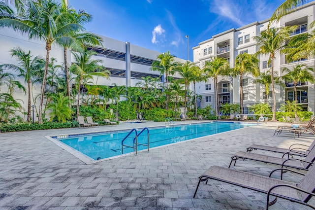 view of swimming pool featuring a patio