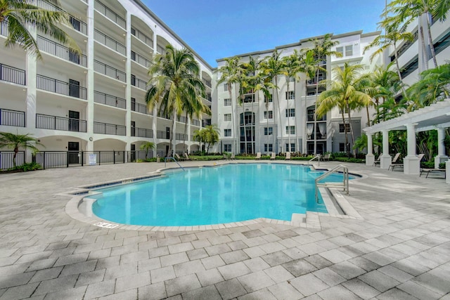 view of pool featuring a pergola and a patio area