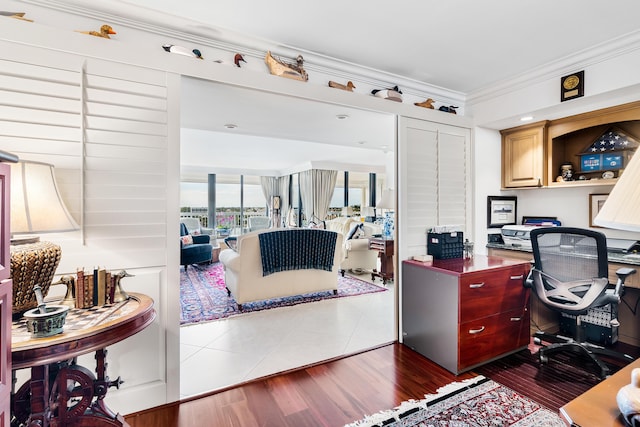 office with crown molding and dark hardwood / wood-style floors