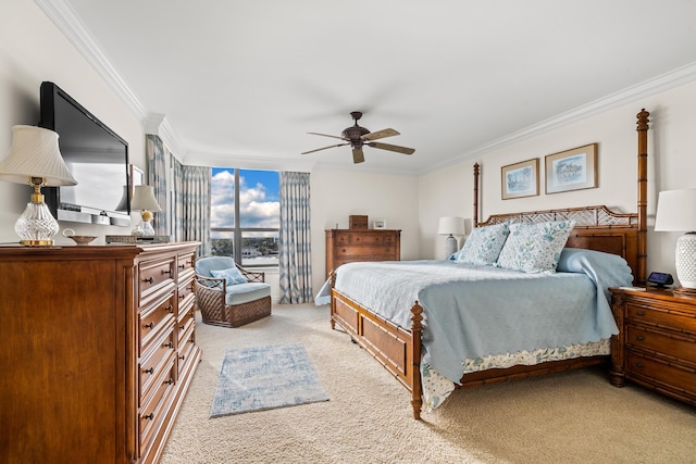 carpeted bedroom with floor to ceiling windows, ceiling fan, and crown molding