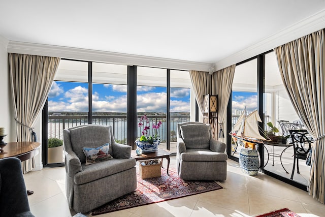 tiled living room featuring a healthy amount of sunlight, a water view, a wall of windows, and crown molding