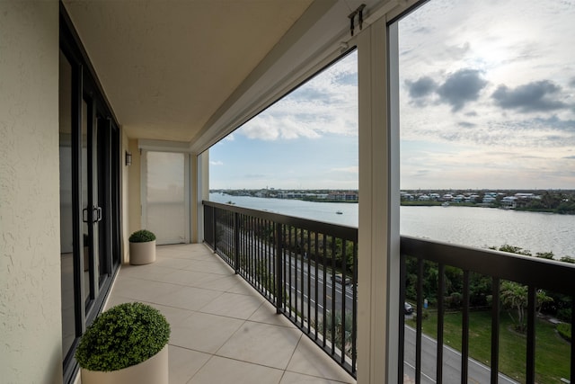 balcony featuring a water view