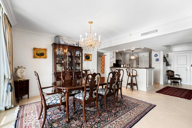 dining room with light tile patterned floors, an inviting chandelier, and crown molding