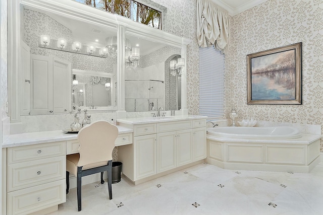 bathroom featuring crown molding, a tub, and vanity