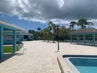 view of home's community featuring a gazebo and a pool