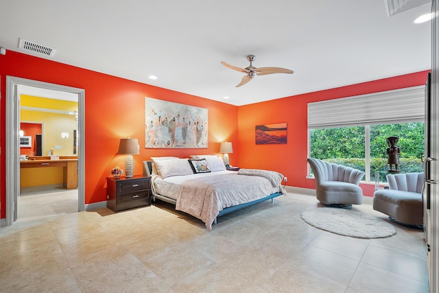 bedroom with ceiling fan and ensuite bathroom