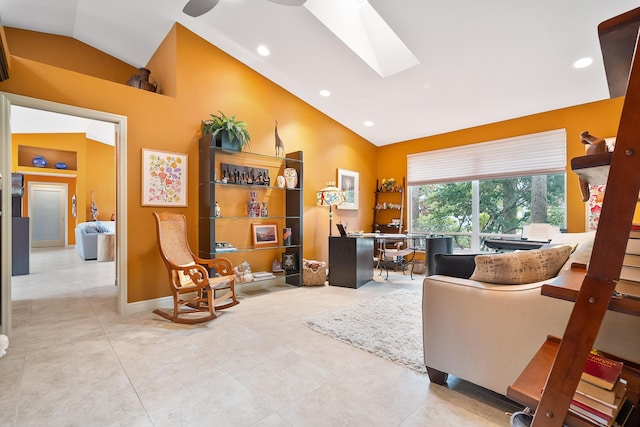 living room featuring vaulted ceiling with skylight