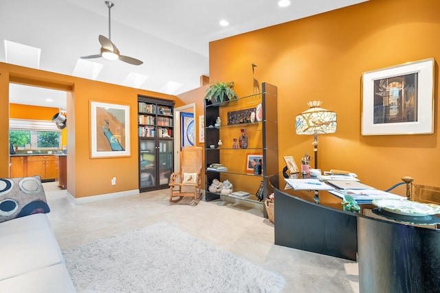 office space featuring lofted ceiling and ceiling fan