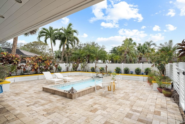 view of pool featuring a patio area