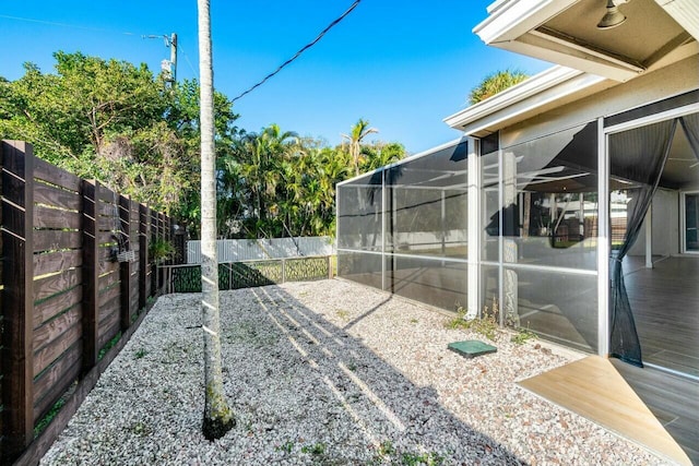 view of yard featuring a lanai and a patio