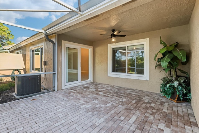 view of patio featuring ceiling fan and central AC