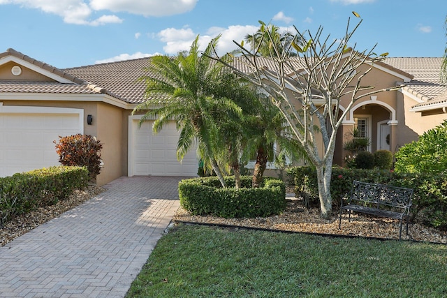 view of front of property with a garage