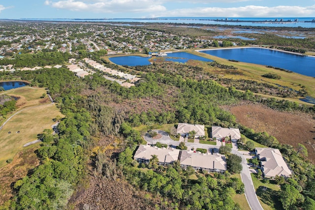 birds eye view of property featuring a water view