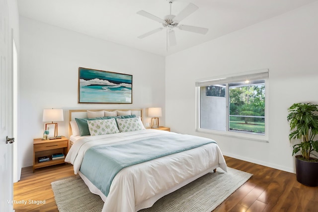 bedroom featuring ceiling fan and hardwood / wood-style flooring