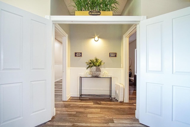 hallway featuring hardwood / wood-style flooring