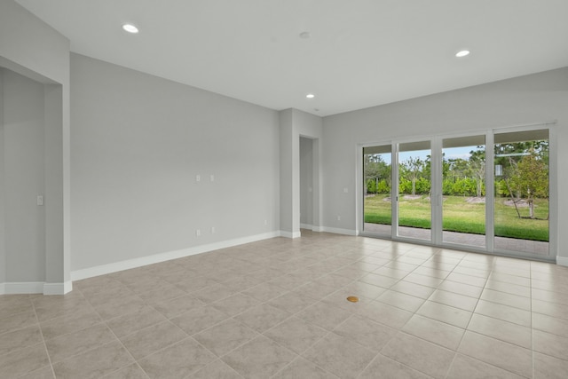 view of tiled spare room